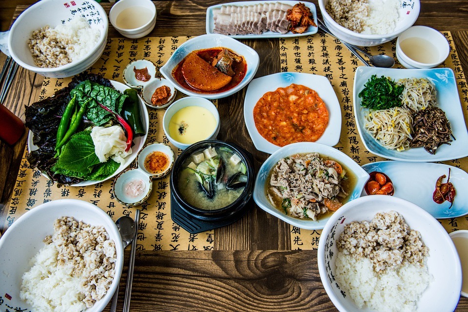 various Korean dishes on a dining table
