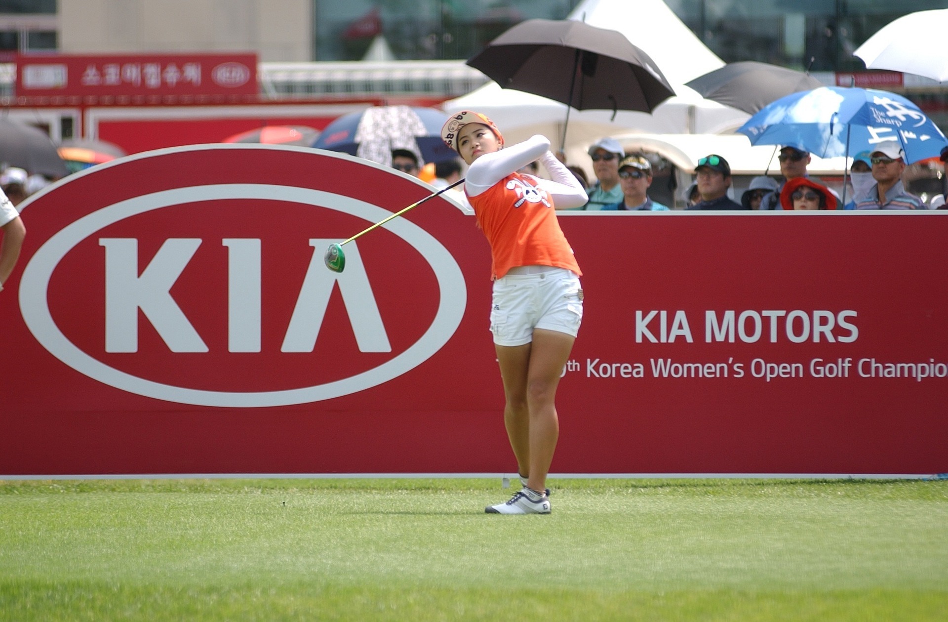 a South Korean woman playing golf