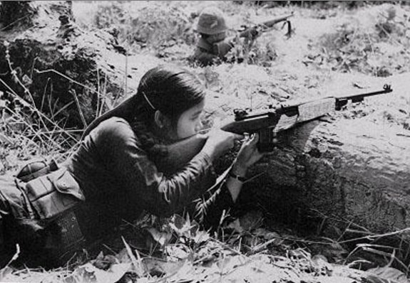 A Female Viet Cong guerrilla in combat
