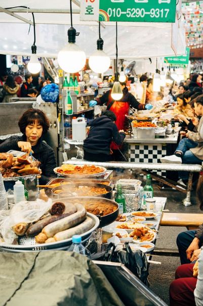 Korean street market, people eating, food