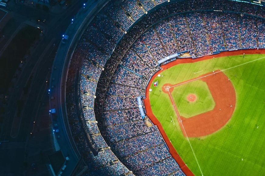an overview of a baseball field filled with people