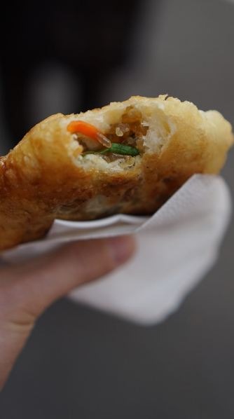 hotteok with vegetable filling, hand