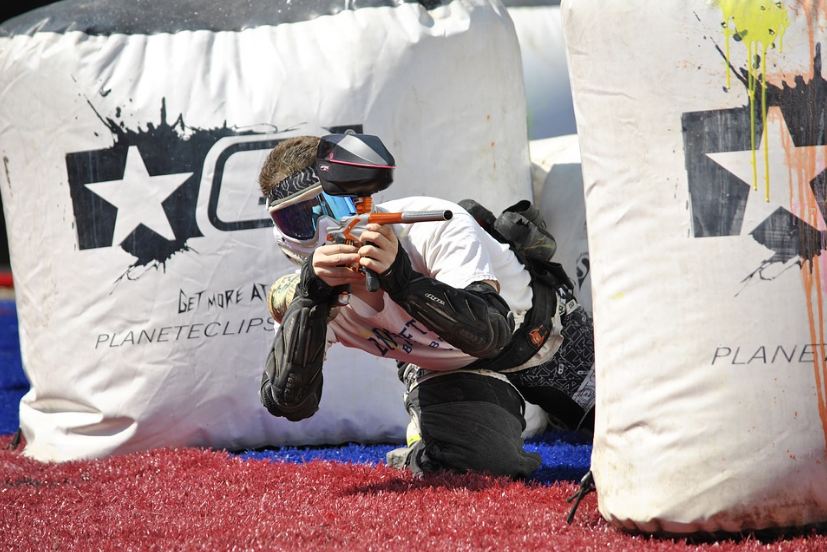Image of a white man playing Paintball.