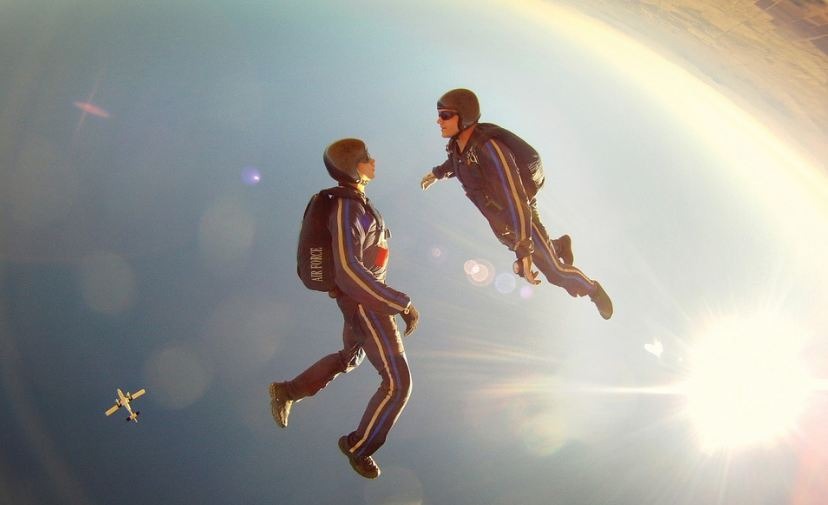 Image of two skydivers in the air.