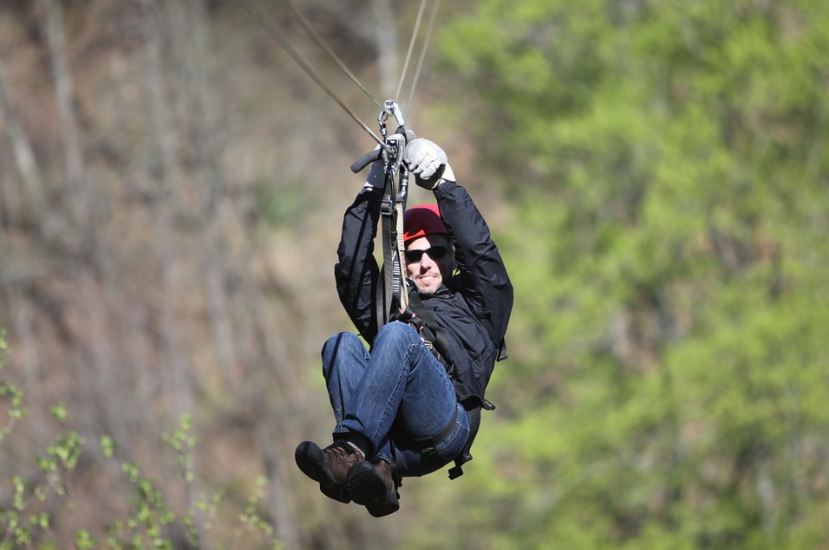 Picture of a man shown on the Ziplining.