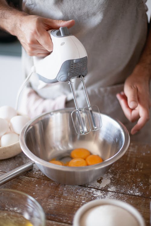 person-holding-a-hand-mixer