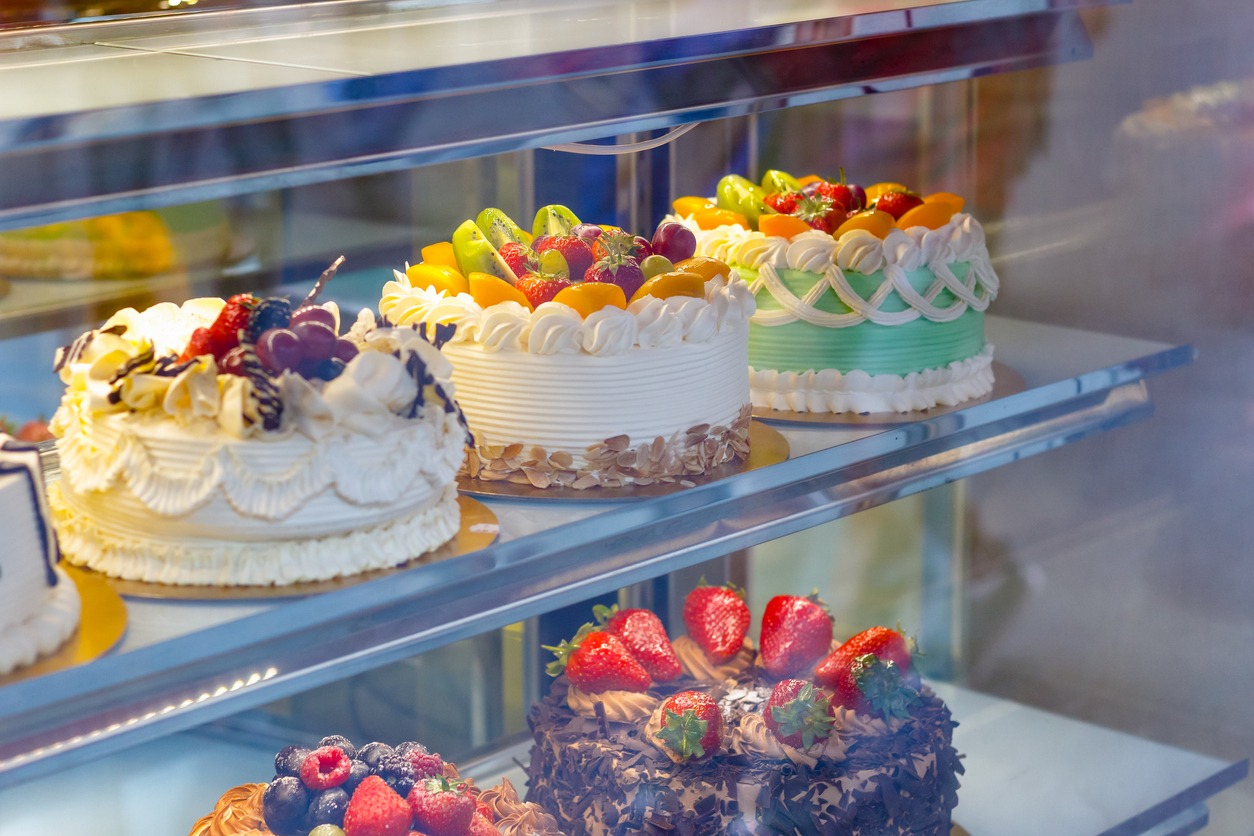 cakes inside a cold display case